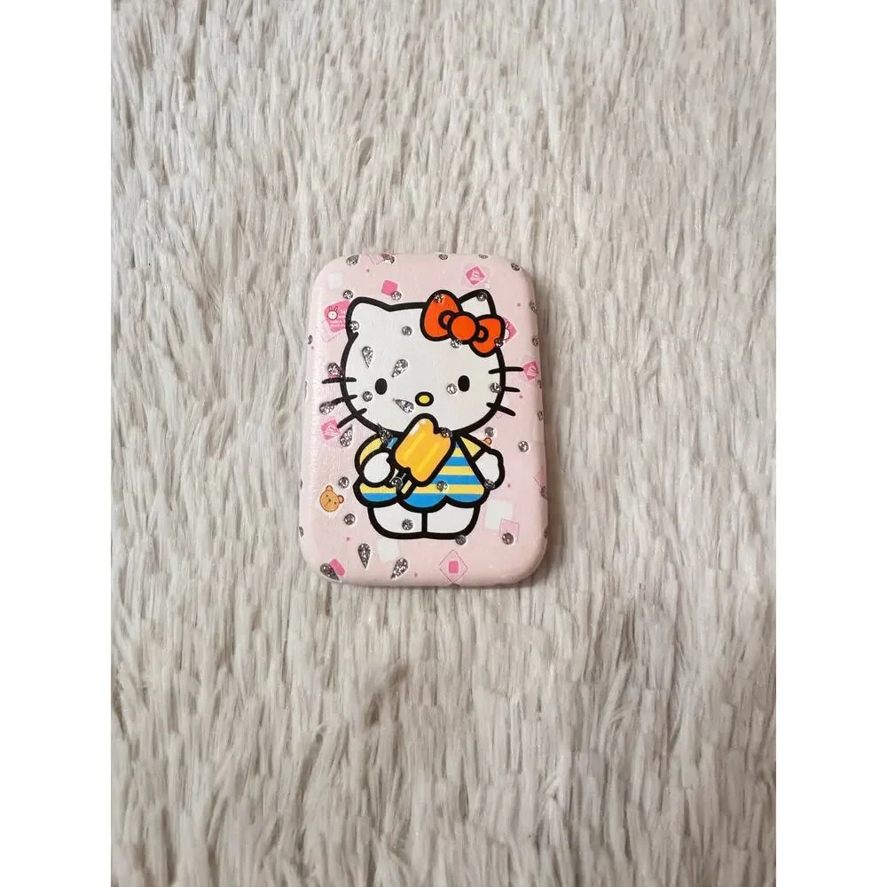 Hello Kitty compact mirror doble side with Hello Kitty holding a popsicle